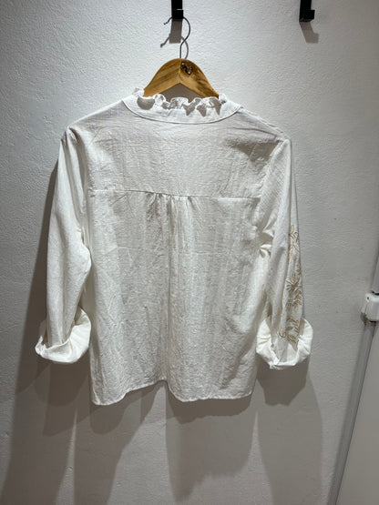 Blusa bordada dorada