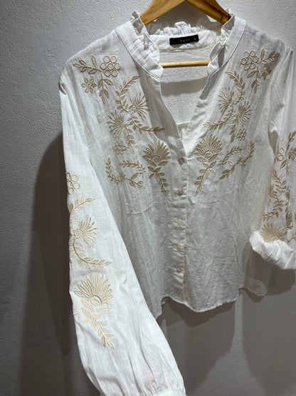 Blusa bordada dorada
